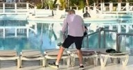 'Insane' battle as tourist sprints to hotel pool to bag seven sunbeds at once