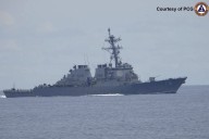 US briefly deploys 2 warships to a disputed South China Sea shoal after Chinese collision