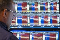 S&P/TSX composite closes slightly higher, U.S. markets slip ahead of inflation data