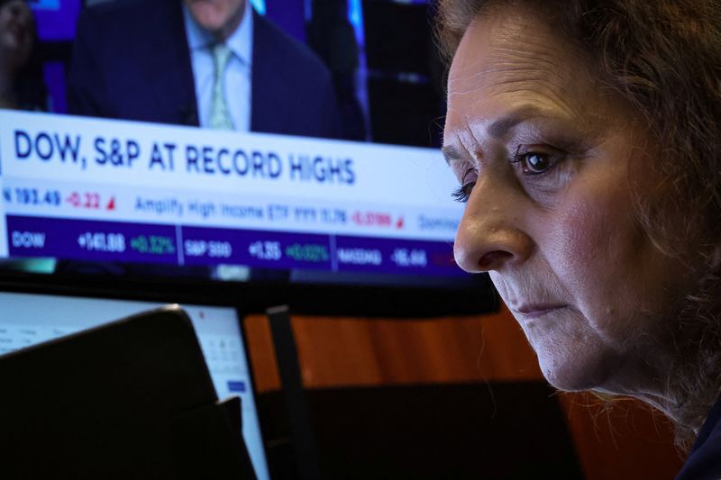 Dow briefly hits record high on UnitedHealth boost; Trump