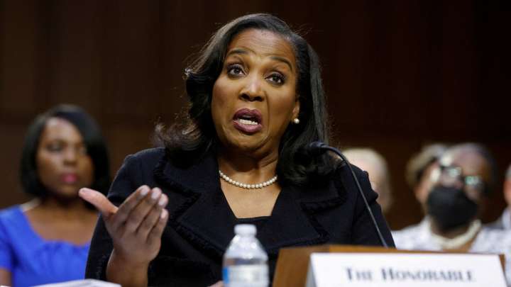 Why has Lisa Cook been removed from the federal office by Donald Trump?