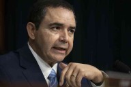 Texas official, wife see 2 counts dropped