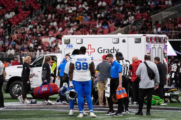 NFL game ends with prayers on the field as player taken off in ambulance