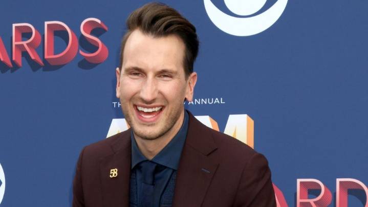Russell Dickerson drops the tracks ‘Sippin’ On Top Of The World,’ ‘Worth Your Wild’