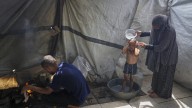 Heat and thirst drive families in Gaza to drink water that makes them sick