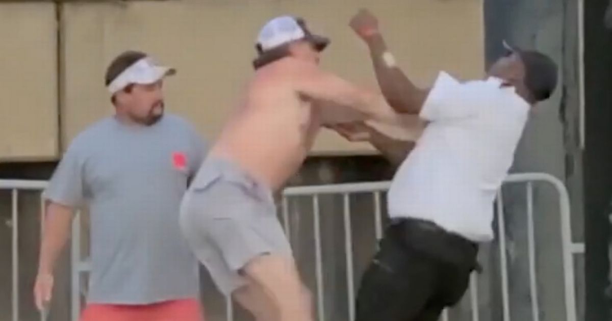 Mass 'WWE-style' brawl in riverside town sees chair-swinging scrapper dubbed 'Black Aquaman'