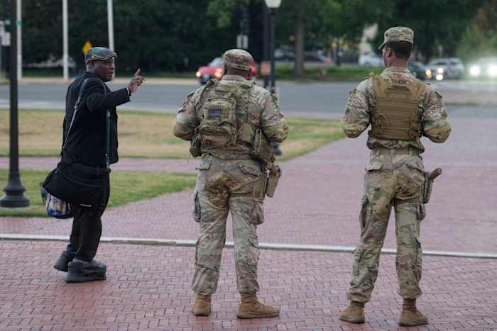 Schools reopen in Washington with parents on edge over Trump's armed patrols