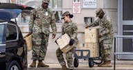 Members of the National Guard begin reporting for deployment in Washington, DC
