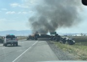 Semitruck rolls, catches fire on Interstate 80 causing traffic delays