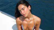 Dua Lipa’s recent holiday wardrobe consists of mini camo shorts and a shell