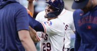 Urìas beats throw to 1st to help the Astros outlast the Orioles, 5
