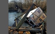 Trucker who collapsed Arkansas bridge in 2019 not driver accused in recent Florida deaths, company official says