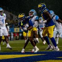 Delaware pulls away from stubborn Delaware State to begin FBS era