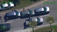 2 arrested after car burglaries at Kissimmee water park