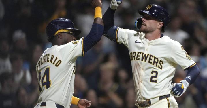 Isaac Collins' sacrifice fly lifts Brewers past Diamondbacks 9