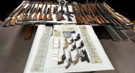 Detectives seize large stash of guns, drugs, cash in Marshall County