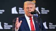 Trump shrugs off suspected Russian hack of U.S. courts