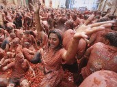 Tons of overripe tomatoes become projectiles in ‘Tomatina’ food fight