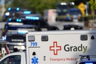 Police say a suspect is dead and a police officer has been injured near the CDC and Emory University