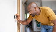 Hide Your Thermostat With A Cute And Cozy DIY