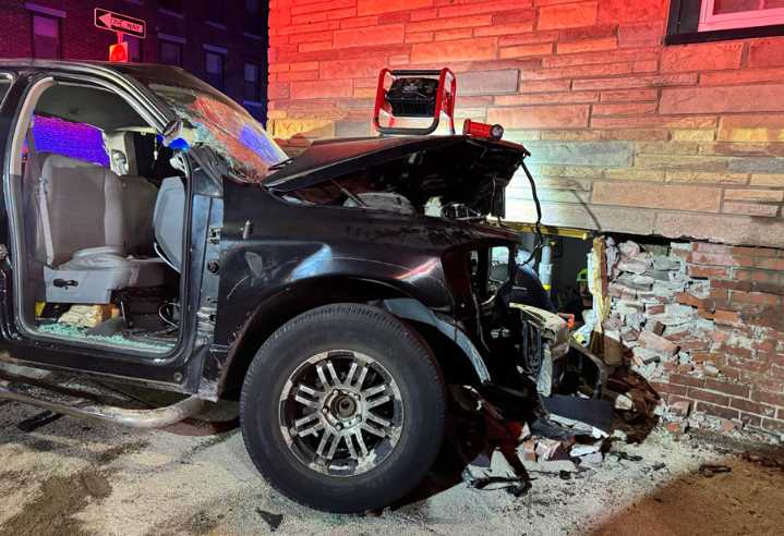 Pickup driver wedges vehicle into East Boston building