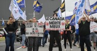 Air Canada passengers still scrambling to rebook as labour dispute grounds flights