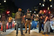 The Latest: Dozens arrested in Washington as White House ratchets up federal police presence