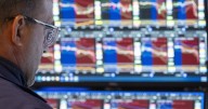 TSX closes higher, U.S. markets slip