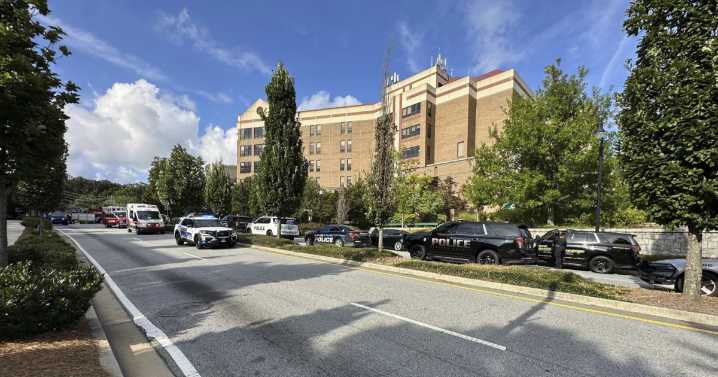Police say a suspect is dead and a police officer has been injured near the CDC and Emory University