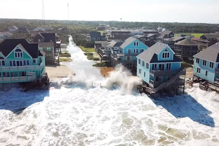 Wild video shows tidal surge swallowing homes as Hurricane Erin slams Outer Banks (Video)