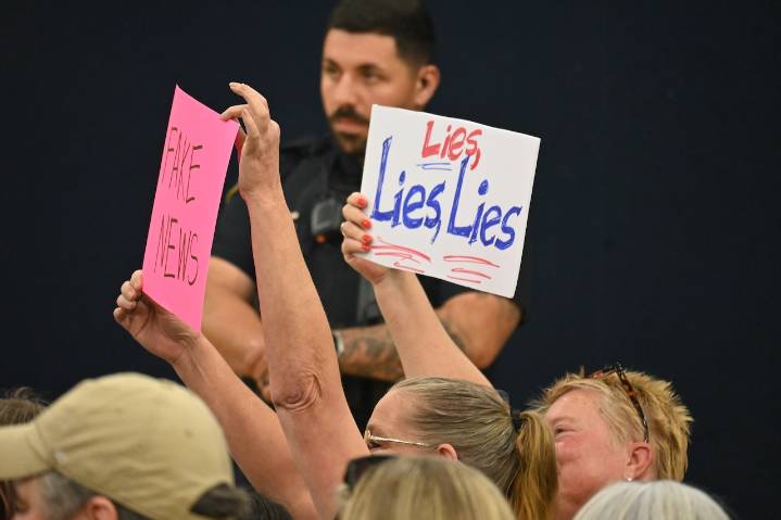 U.S. Rep. Barry Moore, running for US Senate, booed at town hall, leaves out the back