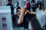 Kilmar Abrego Garcia hugs his wife before being detained by ICE as a crowd chants 'Shame'