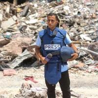 Mourners gather in Gaza for funeral of Al Jazeera staff killed by Israel