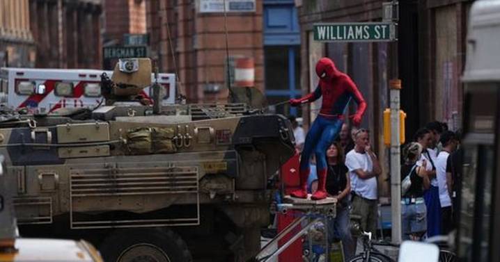Moment Spider-Man stunt double races through Glasgow streets on military vehicle