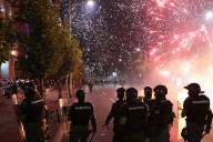 Serbia’s police detain hundreds during violent anti
