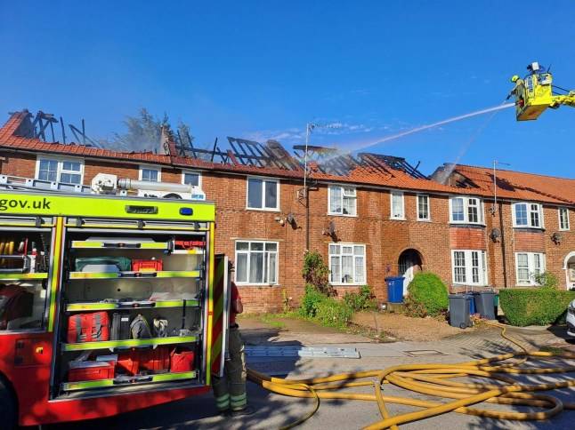 Fire spreads along row of homes in huge blaze in north London