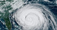 Summer celebrations meet closed beaches and warnings on US East Coast due to Hurricane Erin