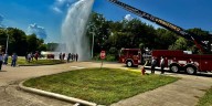 Fire Dept. helps marching band members cool down after practice