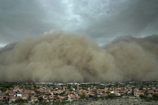 Towering wall of dust rolls through metro Phoenix, leaving thousands without power