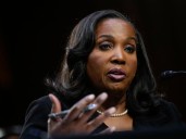 Trump calls for resignation of Fed governor in latest line of attack