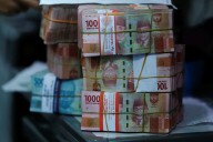 Indonesia central bank says it will remain active in FX market after rupiah dips 1%