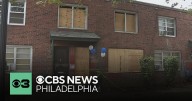 Memorial outside of a North Philadelphia home where a fire killed a 12