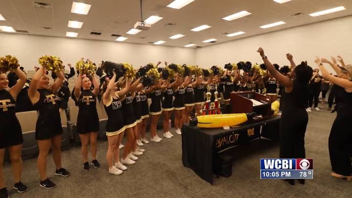New Hope cheer/band teams taking Trojan pride to Disney World