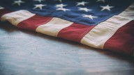 Trump signs executive order directing DOJ to prosecute flag burning
