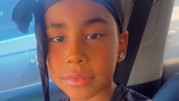 Dozens call for more action on gun violence after Toronto boy killed by stray bullet