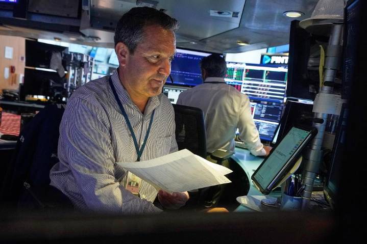 Wall Street drifts around its records following a worldwide rally