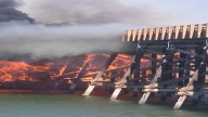 Bridge connecting Arizona and California burns down in wildfire