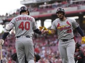 Winn drives in 3 runs, Cardinals take advantage of De La Cruz's error in 10th for 7