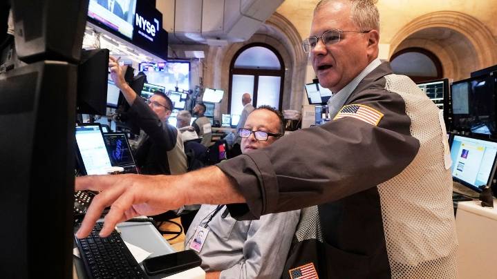 Wall Street soars on hopes for lower interest rates as the Dow surges 846 points to a record