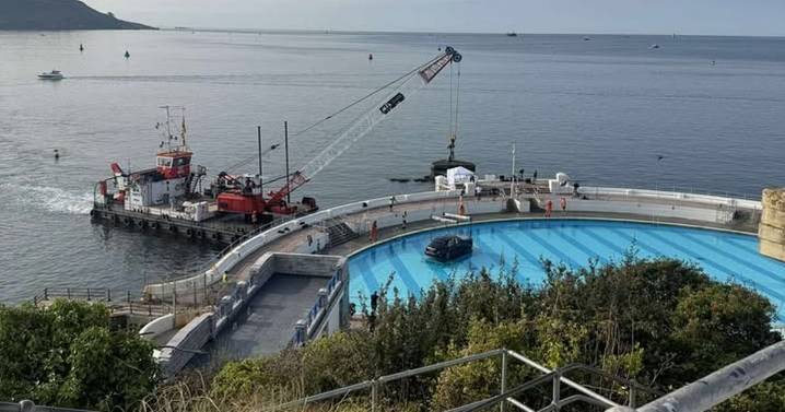Live: Mystery as Rolls-Royce is lowered into Tinside lido